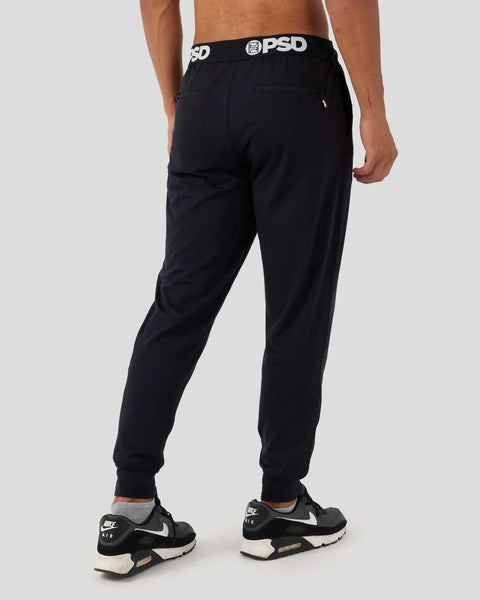 Black joggers with PSD waistband, tapered ankle cuffs, and side pockets.