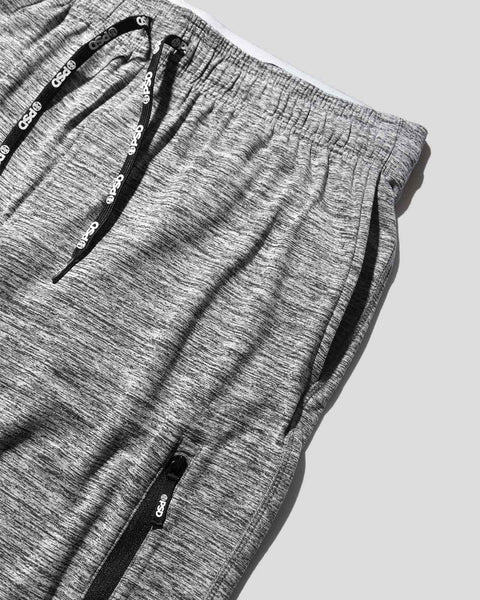 Athletic grey joggers with drawstring waist, side pockets, and black trim details.