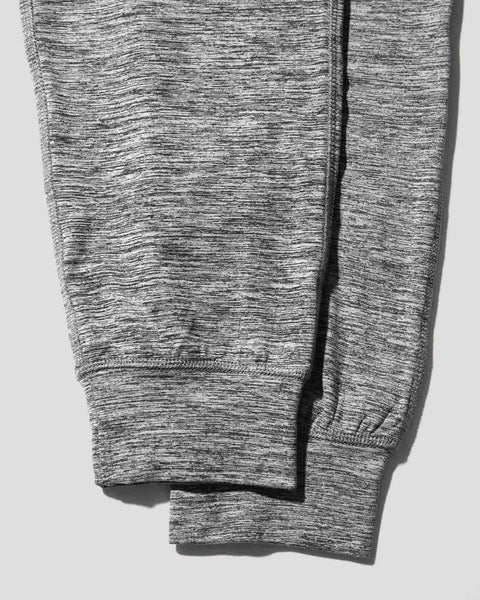 Grey marled joggers with elastic cuffs and drawstring detail at the leg opening.