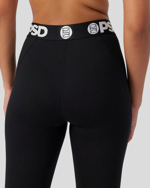 Black briefs with black and white waistband featuring PSD branding and circular logo detail.