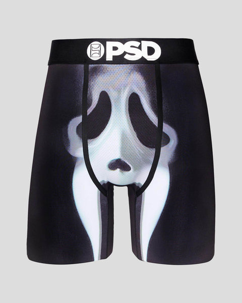 Black PSD boxer shorts with glow-in-the-dark ghostly pale face print and black waistband.