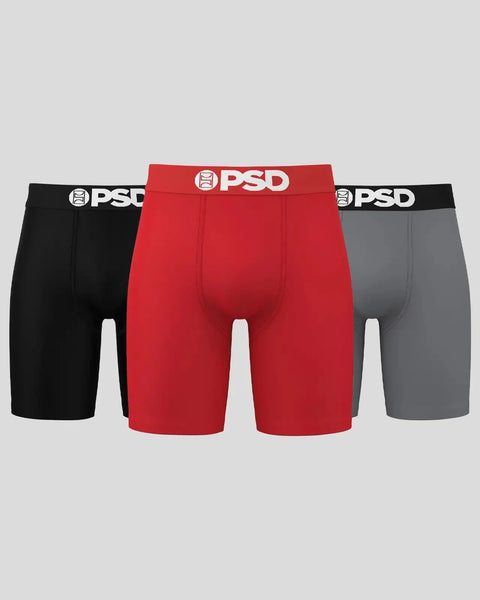 Three solid-color boxer briefs in black, red, and grey with white PSD waistbands.