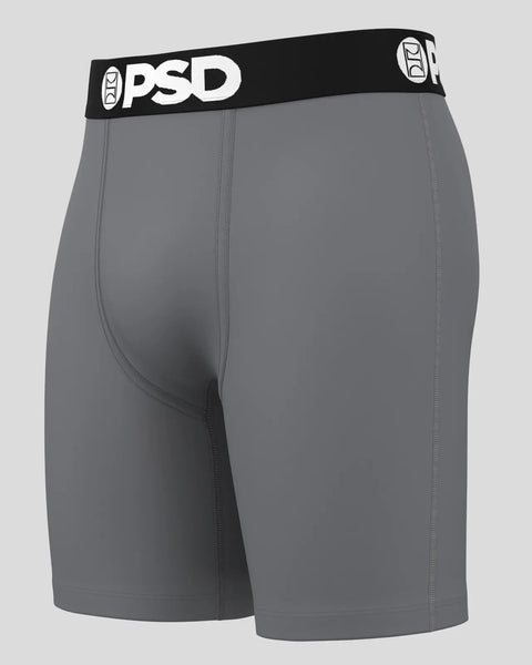 Grey PSD brand boxer briefs with black waistband and white logo visible from front.