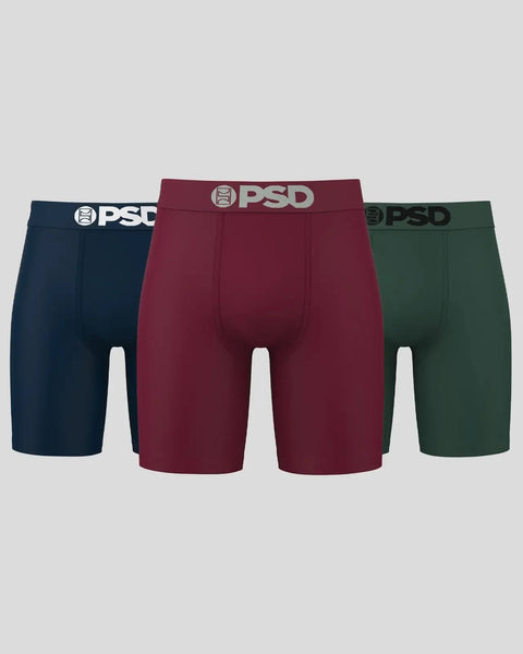 Three PSD brand boxer briefs in navy, burgundy, and forest green with elastic waistbands.