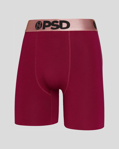 Burgundy boxer briefs with rose gold metallic waistband and PSD branding.
