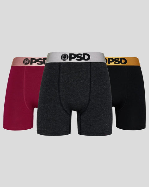 Three PSD boxer briefs in burgundy, charcoal gray, and black with metallic waistbands.
