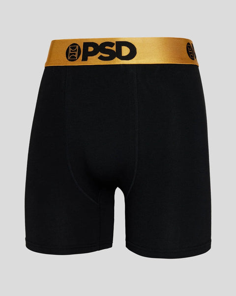 Black boxer briefs with gold metallic waistband featuring PSD logo.