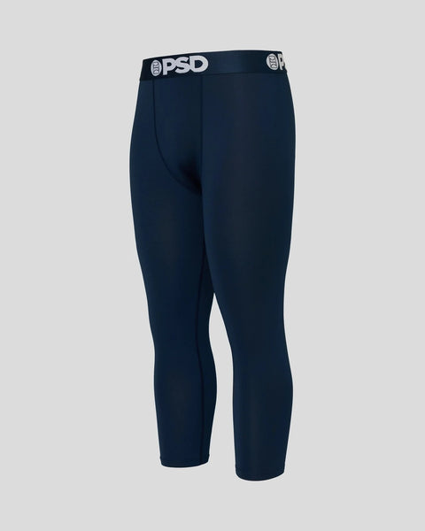 Navy three-quarter length tight with PSD branded elastic waistband.