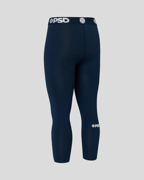 Navy three-quarter length compression tights with PSD branding on waistband and leg.