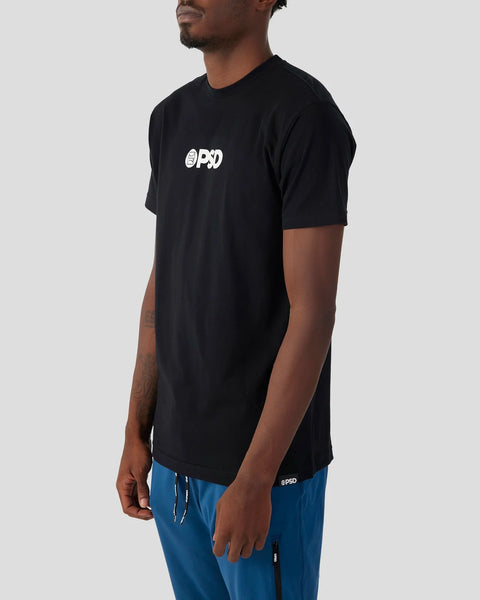 Black short-sleeve t-shirt with white PSD logo on chest, worn with blue shorts.