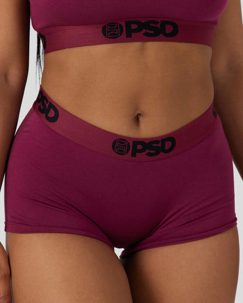 Deep burgundy PSD Modal Solids underwear set with black logo waistband on crop top and boyshort briefs.
