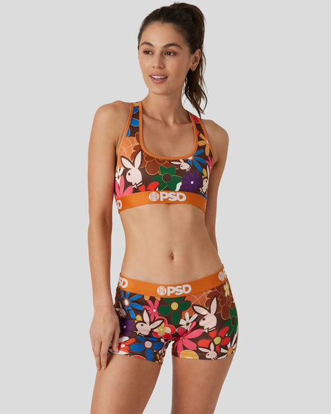 Playboy Funk sports bra and shorts set with multicolored bunny and abstract print and orange PSD waistbands.