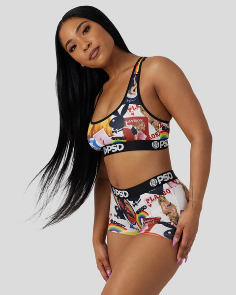 Woman wearing multicolored Playboy-branded sports bra and underwear set with magazine cover print and PSD waistband.