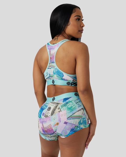 Mint green sports bra and shorts set with multicolored currency print pattern.