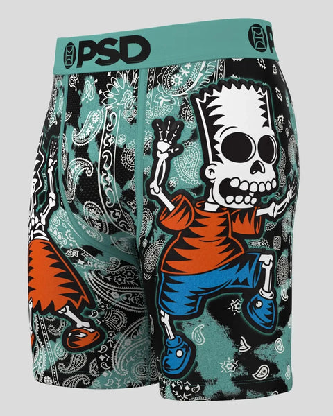 PSD boxer briefs with skull character in orange shirt and blue pants on teal paisley background.