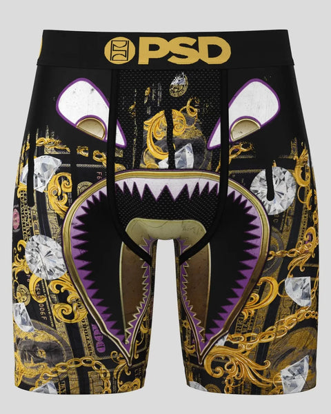 PSD boxer briefs with black base, gold ornamental design, purple and white monster face graphic with sharp teeth detail.