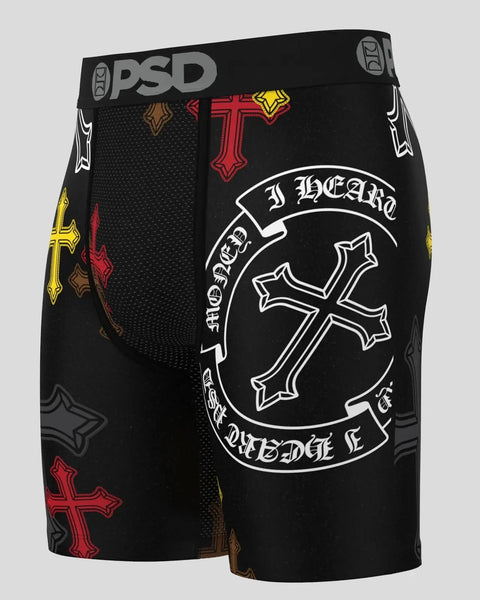 Black PSD boxer briefs with red, yellow, and brown cross patterns and circular emblem graphic on front.