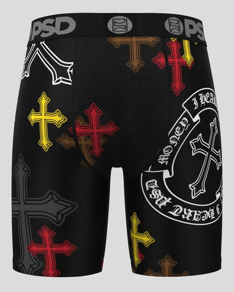 Black PSD boxer briefs with multicolored decorative cross graphics and text print throughout.