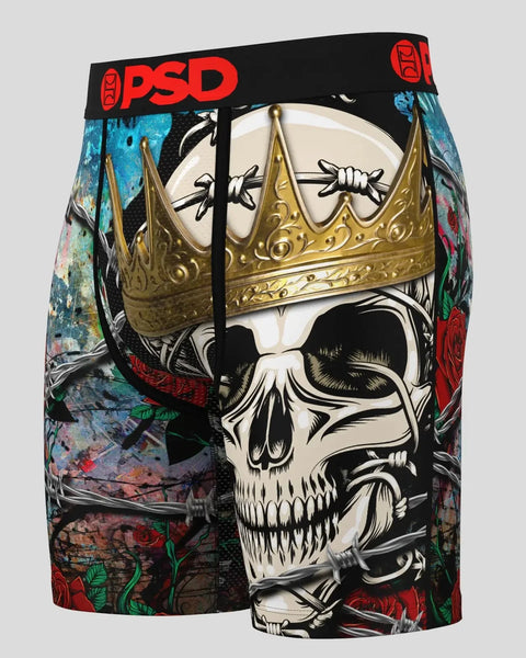 PSD boxer briefs with skull wearing gold crown design and red rose floral pattern on black waistband.