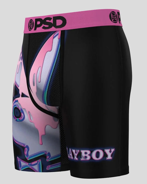 PSD boxer briefs with pink waistband, pink and blue graphic print on left leg, black mesh panel, and Playboy text on right le