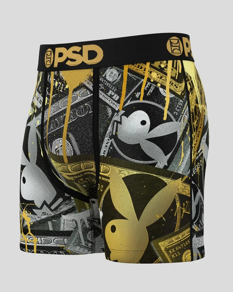 PSD boxer shorts with black waistband featuring gold and silver Playboy bunny logos and money print design.