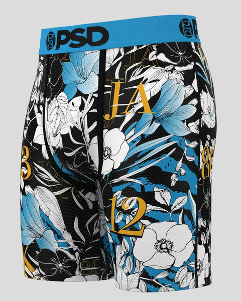 PSD boxer briefs with blue waistband, featuring black and white floral print with blue flowers and gold 
