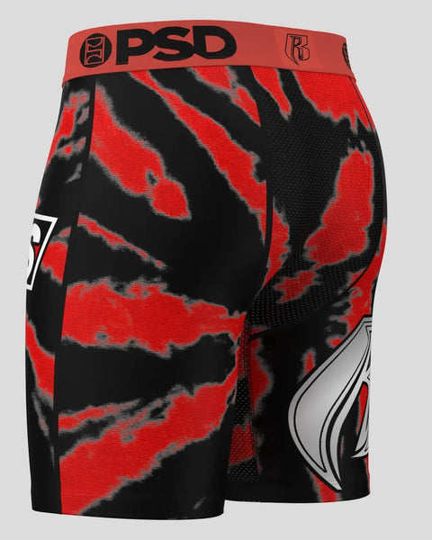 PSD men's boxer briefs with red and black abstract pattern, red waistband, and graphic design on leg.
