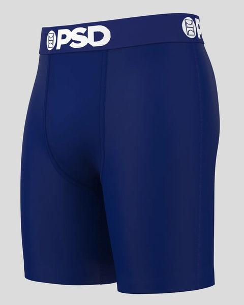 Dark blue PSD brand boxer briefs with white logo waistband and visible seam detailing.
