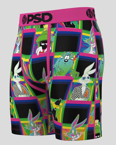 Colorful neon boxers with Looney Tunes characters in grid pattern, pink waistband with PSD branding, mesh panels.