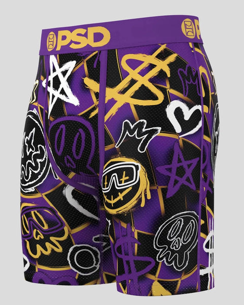 Purple and black boxer briefs with yellow, white, and purple graffiti-style graphics and PSD waistband.