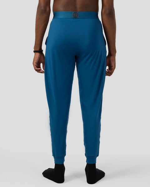 Teal lounge pant with elasticated waistband and cuffed ankles, shown from back view.