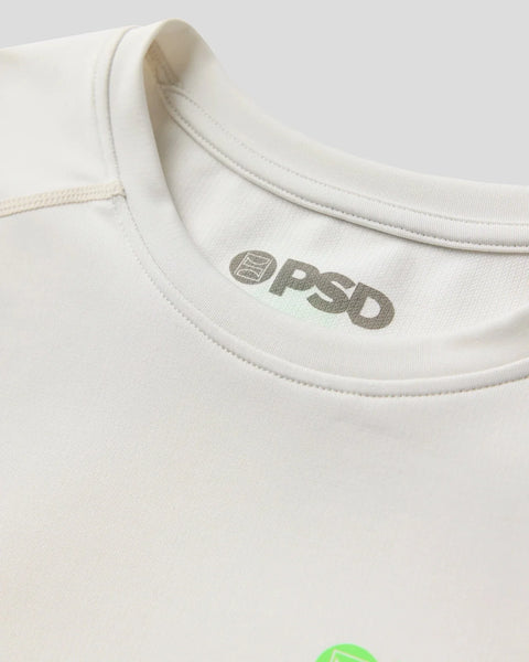 Cream-colored long sleeve compression tee with crew neckline and gray OPSD logo on chest.