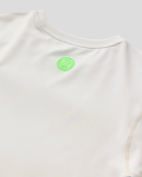 Ash gray compression tee with short sleeves and small green logo on chest.