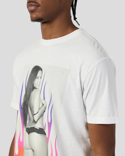 White crewneck t-shirt with black and white portrait graphic surrounded by purple and pink flame design on chest.