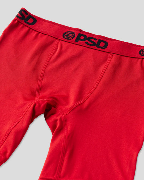 Red briefs with black PSD waistband and logo details.