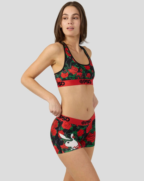 Black sports bra and shorts set with red roses, green leaves, and snake design with red PSD waistband.