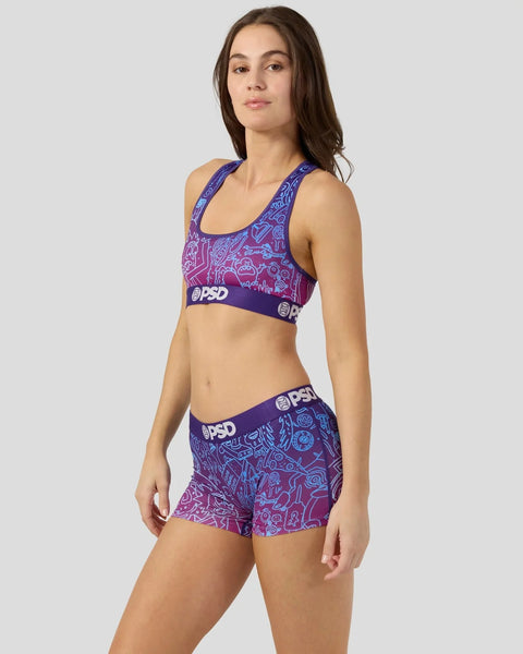 Purple and pink Rick and Morty-themed sports bra and shorts set with PSD branding and cartoon character print.