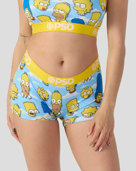 Person wearing yellow and blue Simpsons character print underwear with yellow PSD waistband.