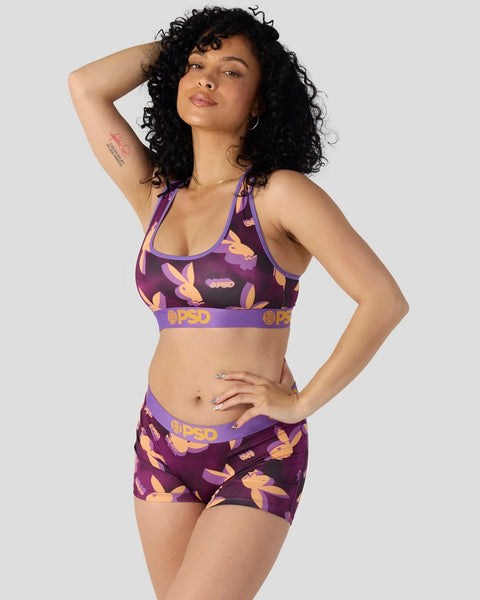 Purple sports bra and shorts set with Playboy bunny print and purple elastic bands.