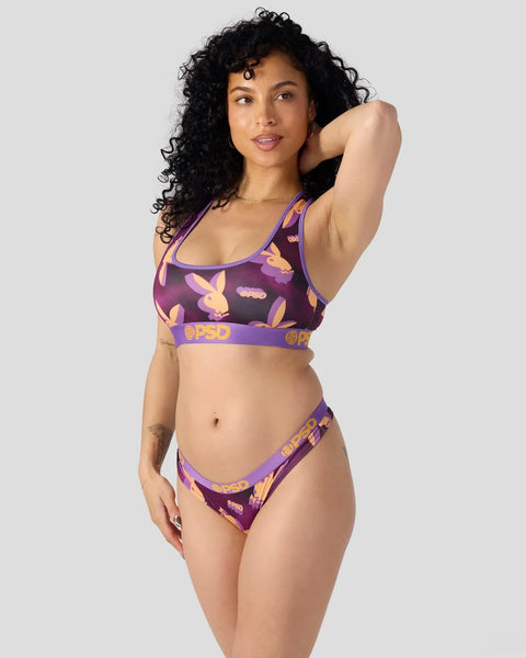 Purple sports bra and briefs set with Playboy bunny print and purple trim.