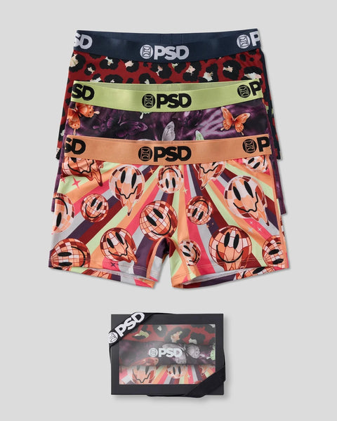 Three PSD branded boxer briefs with red leopard print, purple butterfly, and multicolor geometric ball patterns with contrast