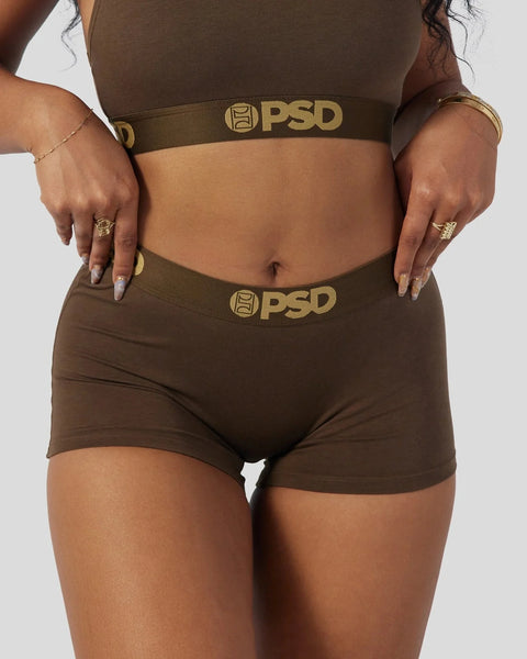 Cocoa brown sports bra and boyshort set with gold PSD waistband and trim.
