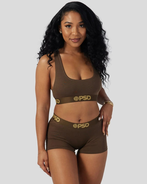 Brown modal sports bra and boyshort set with gold PSD logo waistband.