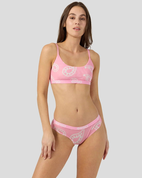 Pink bandana-print mesh bikini with white paisley pattern on sports bra top and matching briefs.