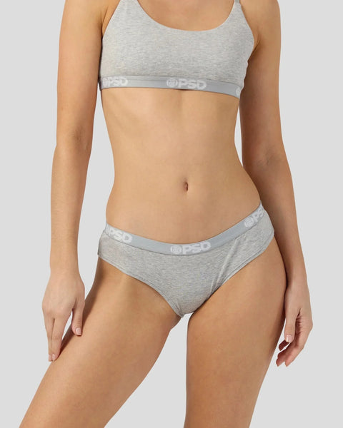 Light gray modal bra and bikini briefs set with branded elastic waistbands shown on model.