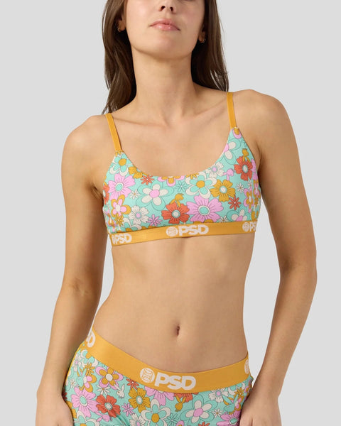 Colorful floral print bralette and matching briefs with yellow straps and gold waistband featuring PSD branding.