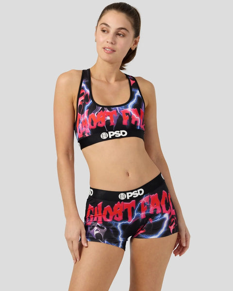 Women's sports bra and shorts set with red "Ghost Face" text and blue lightning bolt pattern on black background.