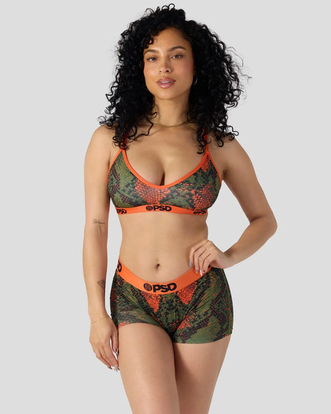 Green and orange snake-scale patterned bra and shorts set with orange trim and OPSD branding.