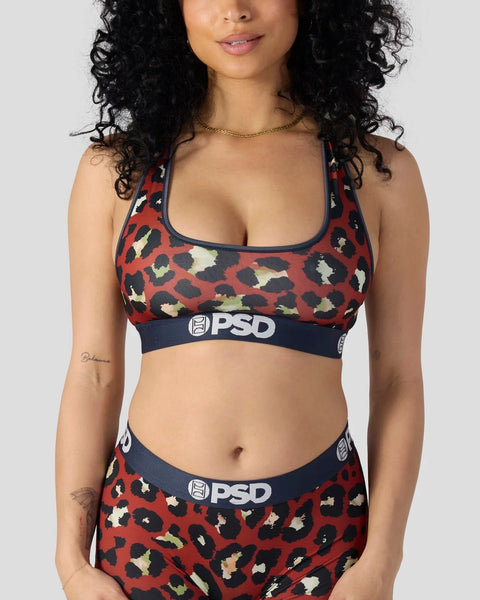 Red leopard print sports bra and underwear set with navy blue PSD waistbands.