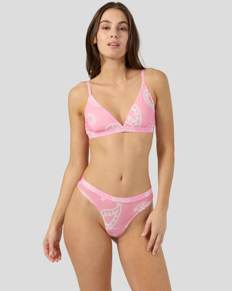 Pink bandana-print mesh bikini set with adjustable straps and underwire top on model.
